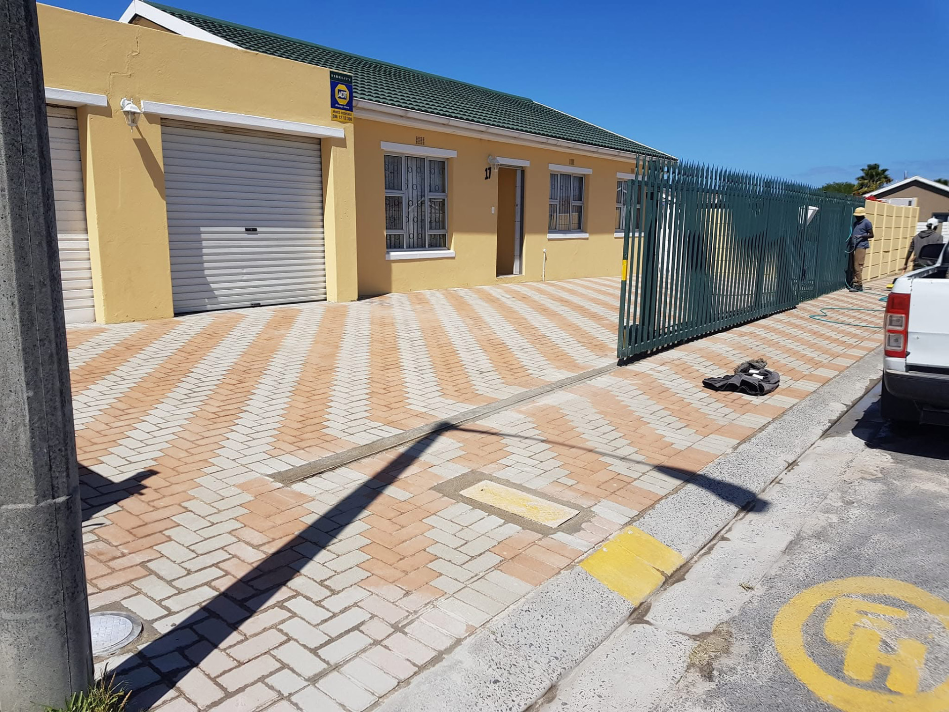 Newly laid interlocking brick driveway paving in front of a Cape Town home